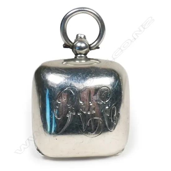 A silver sovereign case,