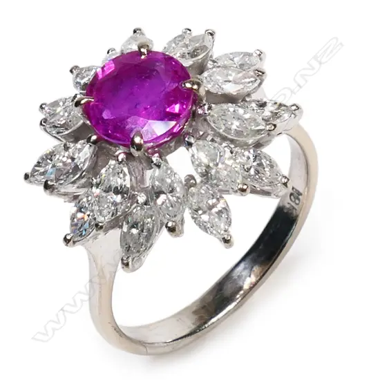 An 18ct white gold pink sapphire and diamond cluster ring,