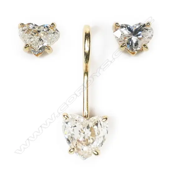 A set of 14ct gold and heart cut diamond pendant and pair of earrings,