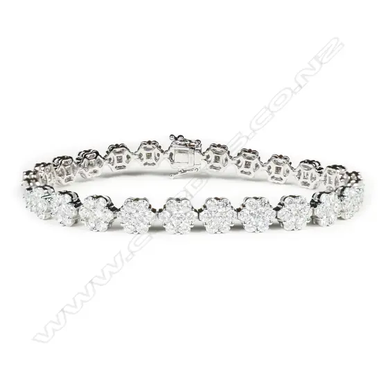 An impressive 18ct white gold multi diamond cluster bracelet,
