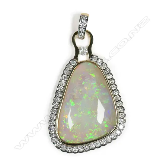 A 14ct gold opal and diamond pendant,