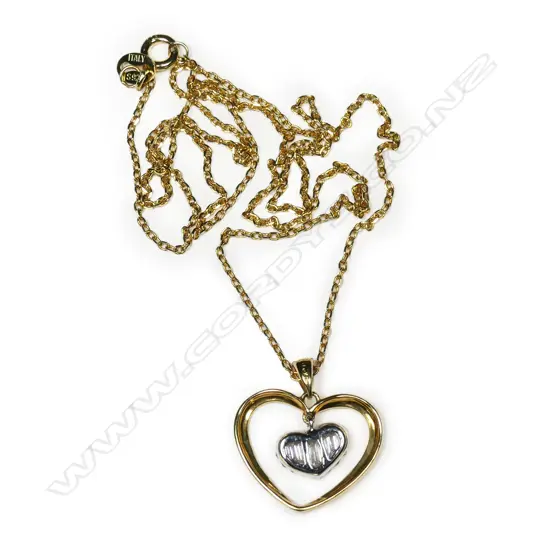 An 18ct yellow gold and diamond pendant,