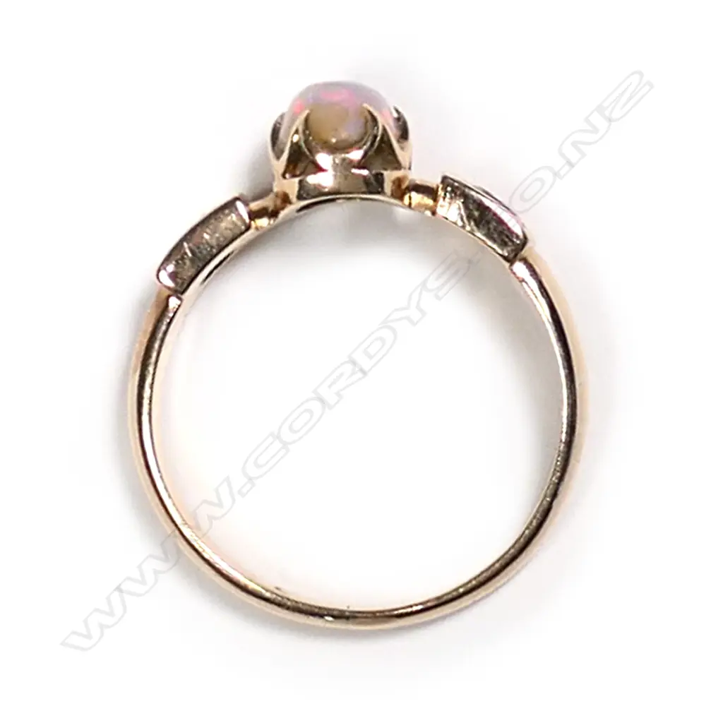 An 18ct ruby and opal ring Image 1++
