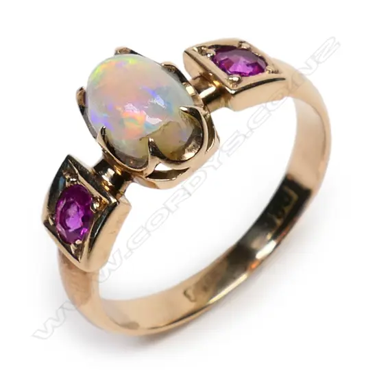 An 18ct ruby and opal ring
