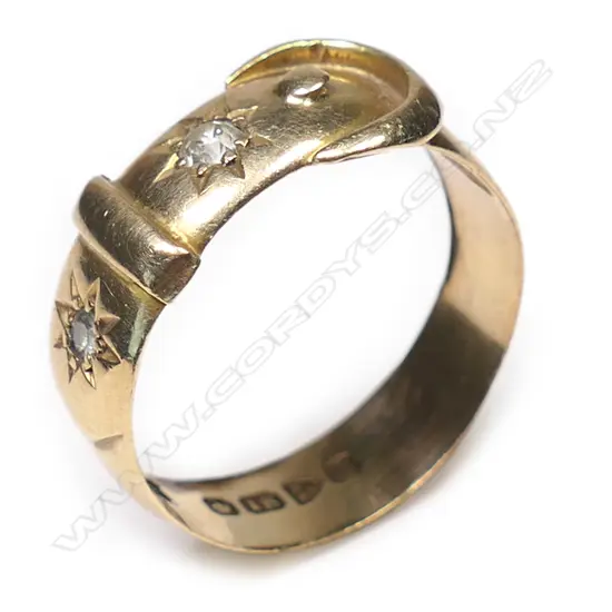 An early 20thC 18ct yellow gold and diamond buckle ring,