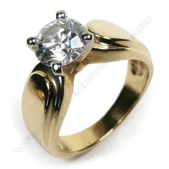 An 18ct gold and diamond solitaire ring,