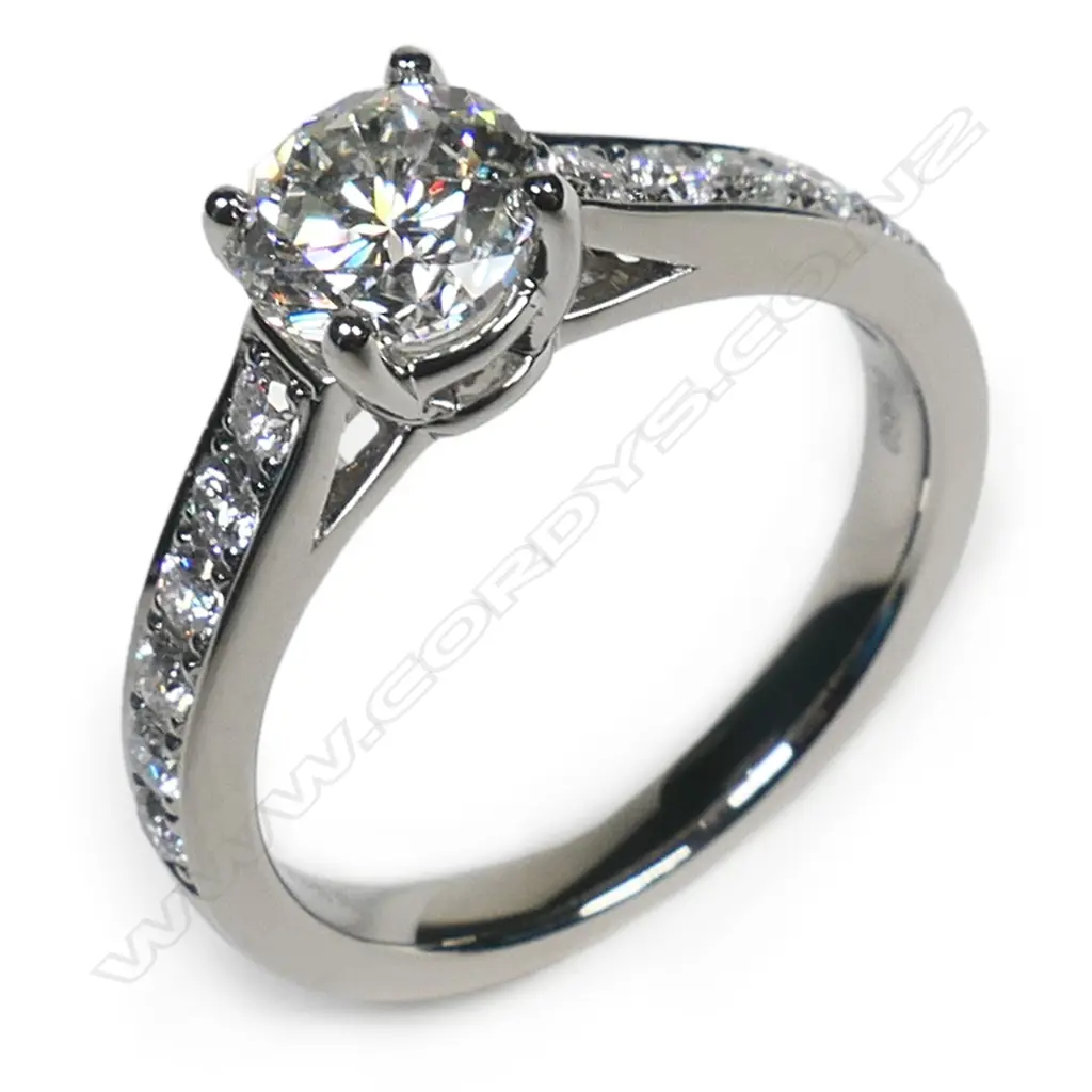 An 18ct white gold and diamond solitaire ring, Image 1++