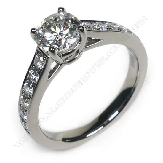 An 18ct white gold and diamond solitaire ring,