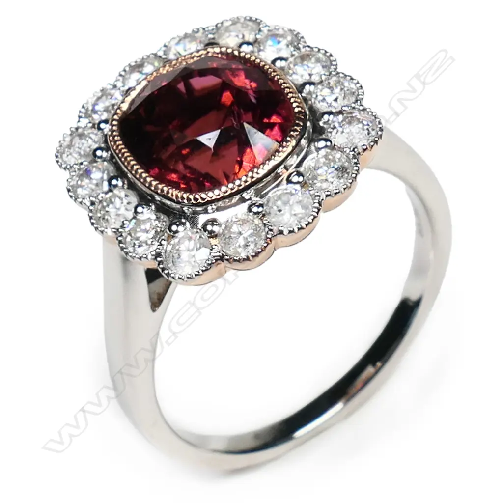 A 14ct rose and white gold tourmaline and diamond halo ring, Image 1++
