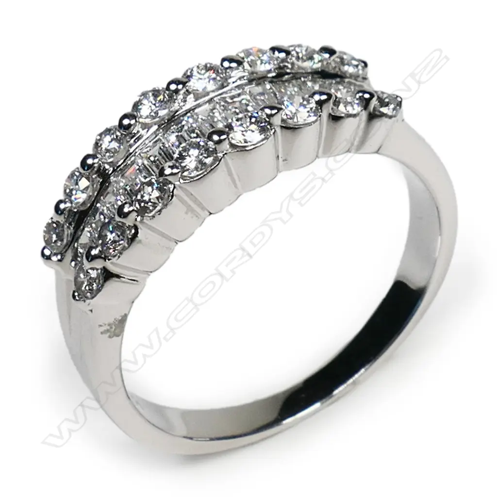 An 18ct white gold and multi diamond ring, Image 1++