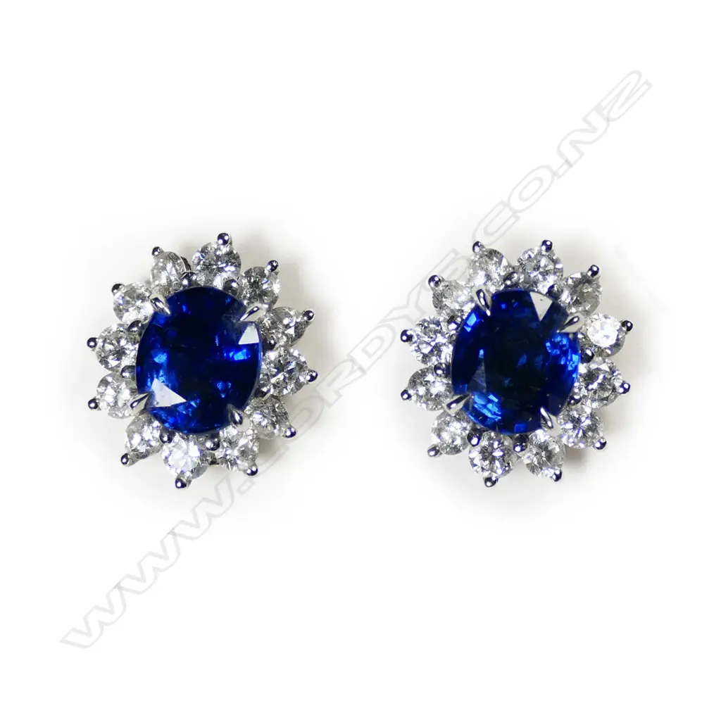 A pair of 18ct white gold sapphire and diamond stud earrings, Image 1++