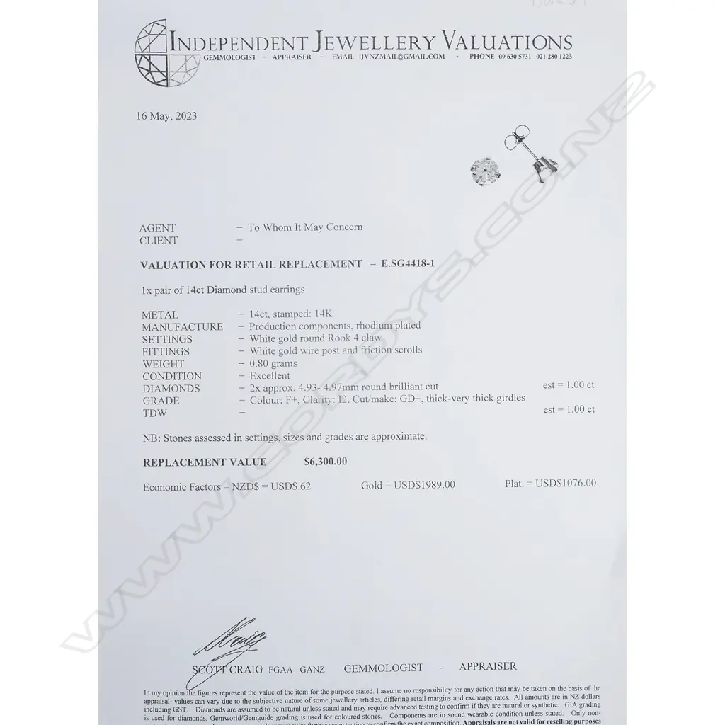 A pair of 14ct white gold and diamond stud earrings, Image 1++