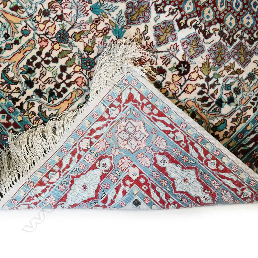 A fine hand-knotted silk rug, Image 1++