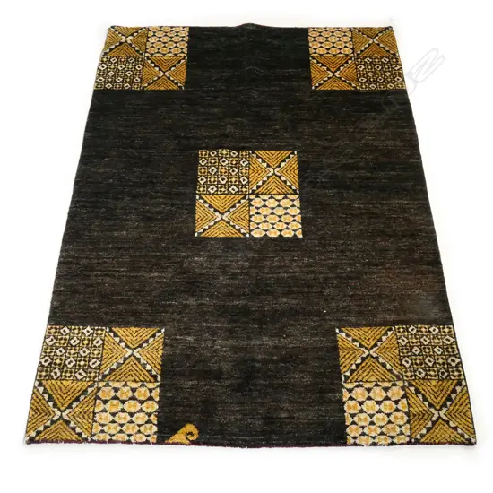 A hand-knotted Gabbeh rug designed by Hundertwasser,