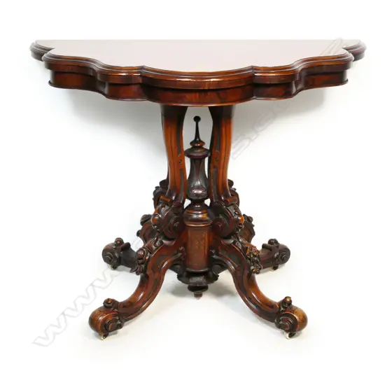 A Victorian walnut flap top card table,