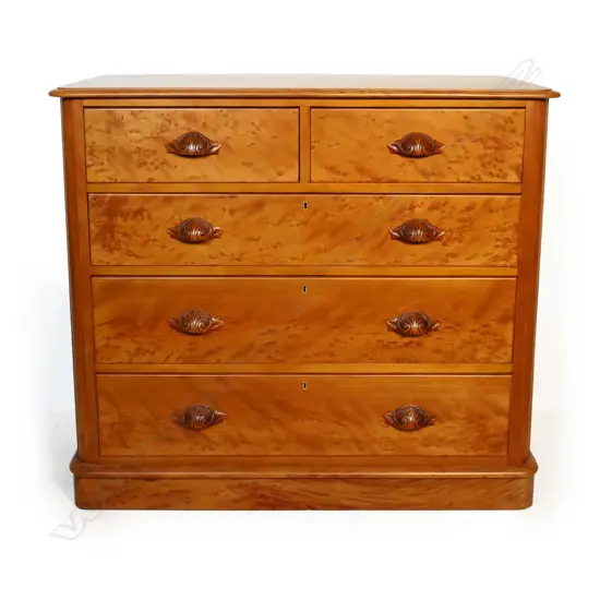A colonial mottled kauri chest of drawers,