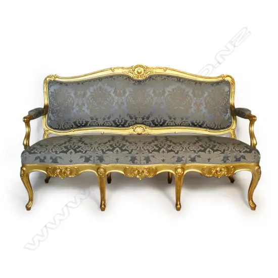 An early/mid 20thC antique style French giltwood settee,
