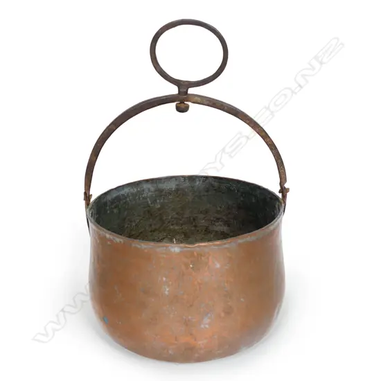 A vintage copper cooking pot,
