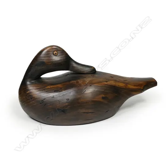 A 12" hand carved duck decoy,