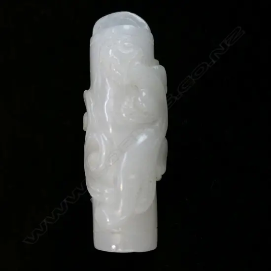 A Chinese carved pale green/white jade pendant,