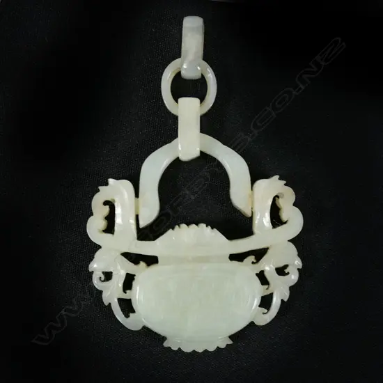 A Chinese carved pale jade basket form pendant,