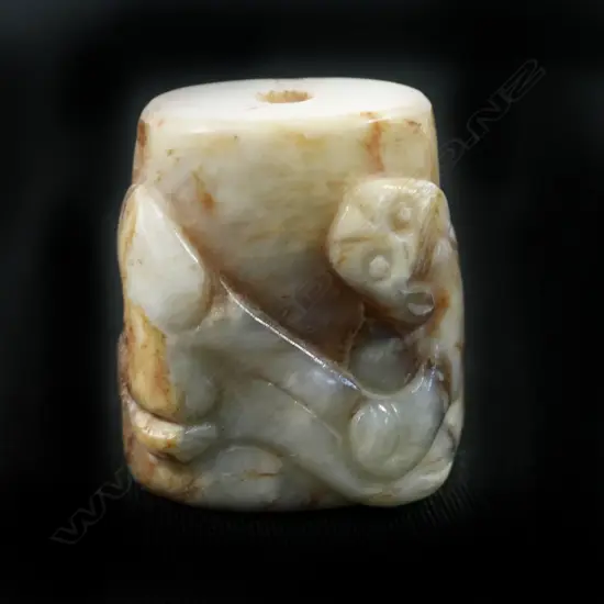 A Chinese carved jade bead,