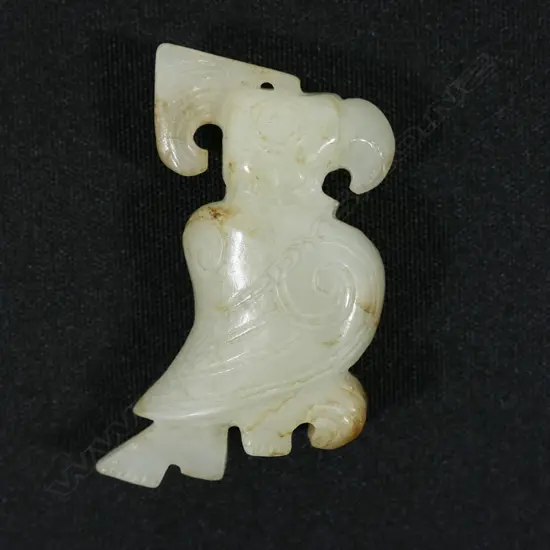 A Chinese carved jade parrot pendant,