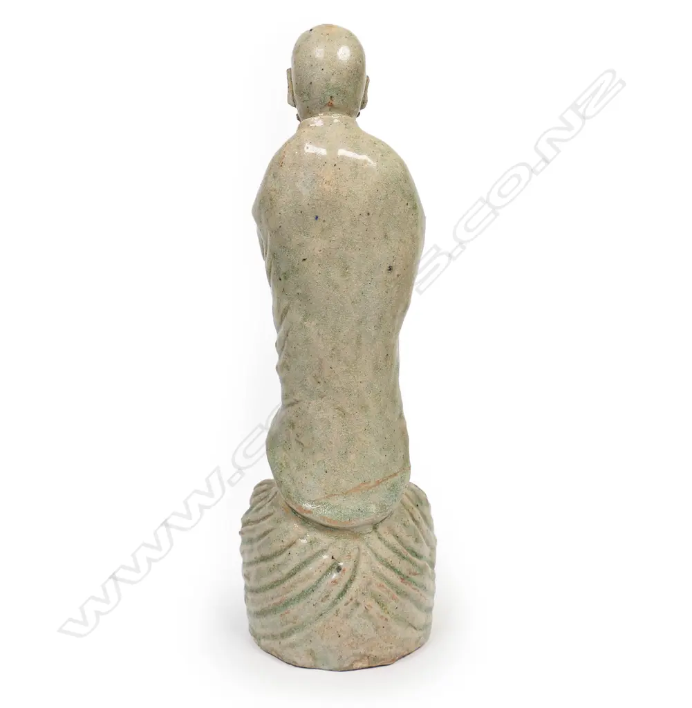 An old Chinese celadon glazed deity figure, Image 1++