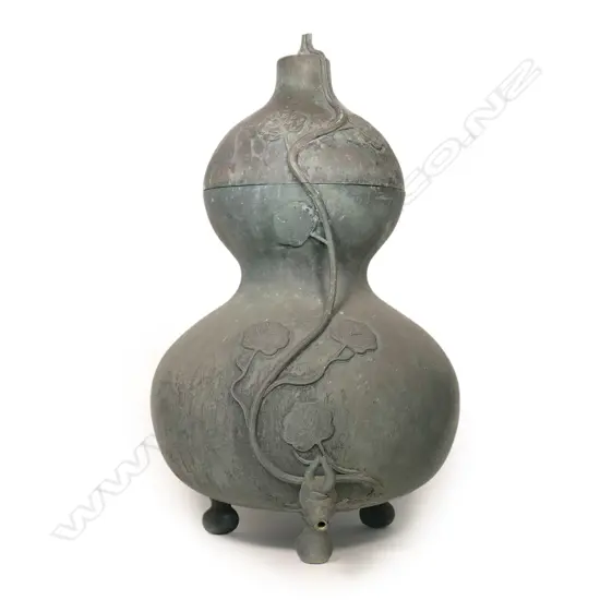 A large old Japanese bronze temple water dispenser,