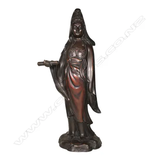 An oriental tall bronze of Quan Yin,