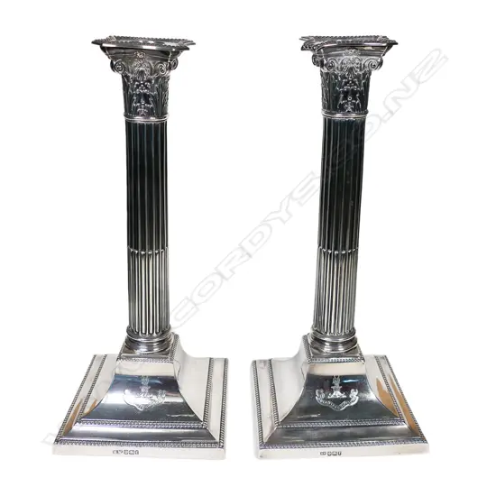 A pair of Victorian silver Corinthian column candlesticks,