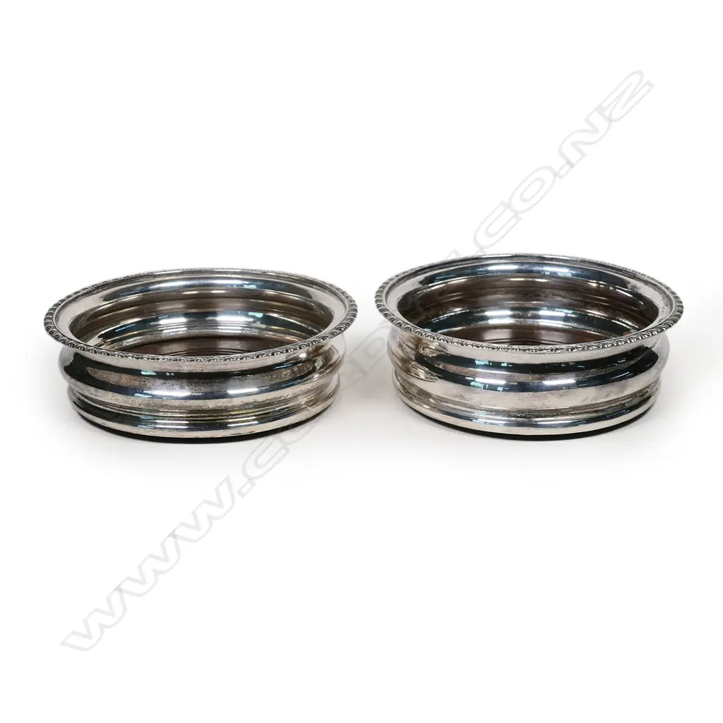 A pair of late Victorian silver plate wine coasters, Image 1++