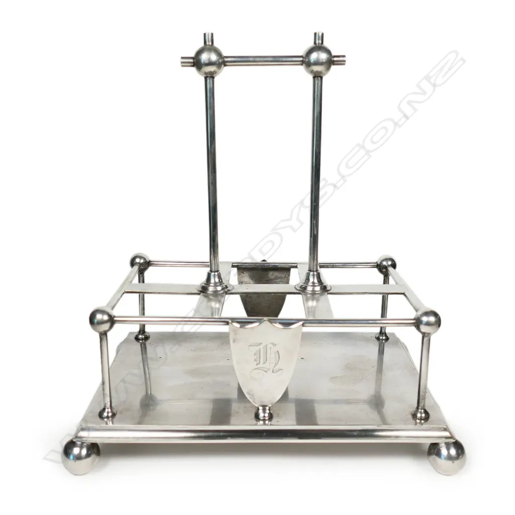 A Victorian Arts & Crafts Christopher Dresser style silver plate cruet stand, Image 1++