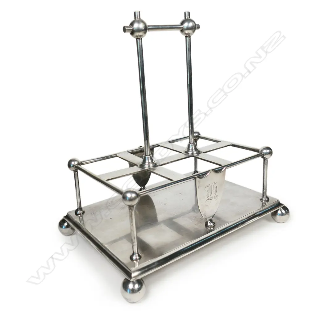 A Victorian Arts & Crafts Christopher Dresser style silver plate cruet stand, Image 1++