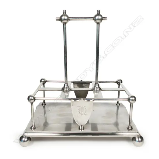 A Victorian Arts & Crafts Christopher Dresser style silver plate cruet stand,