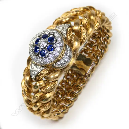 An impressive Hausmann & Co. vintage ladies 18ct gold, diamond and sapphire bracelet cocktail wristwatch,