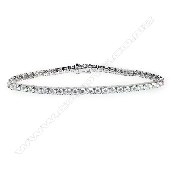 An 18ct white gold and diamond tennis bracelet,