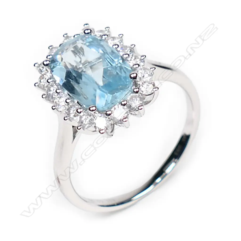 A 14ct white gold, aquamarine and diamond halo cocktail ring, Image 1++