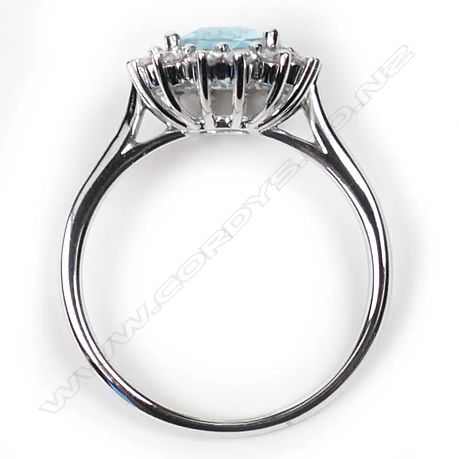 A 14ct white gold, aquamarine and diamond halo cocktail ring, Image 1++