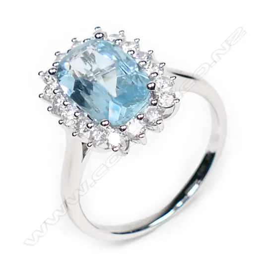 A 14ct white gold, aquamarine and diamond halo cocktail ring,