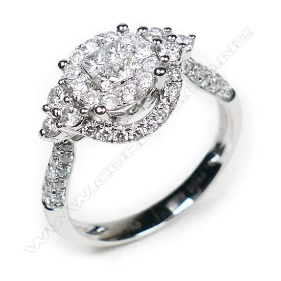 An 18ct white gold and diamond cluster ring,