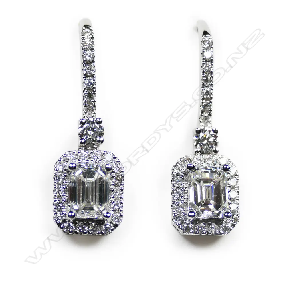 A pair of 18ct white gold and diamond earrings, Image 1++