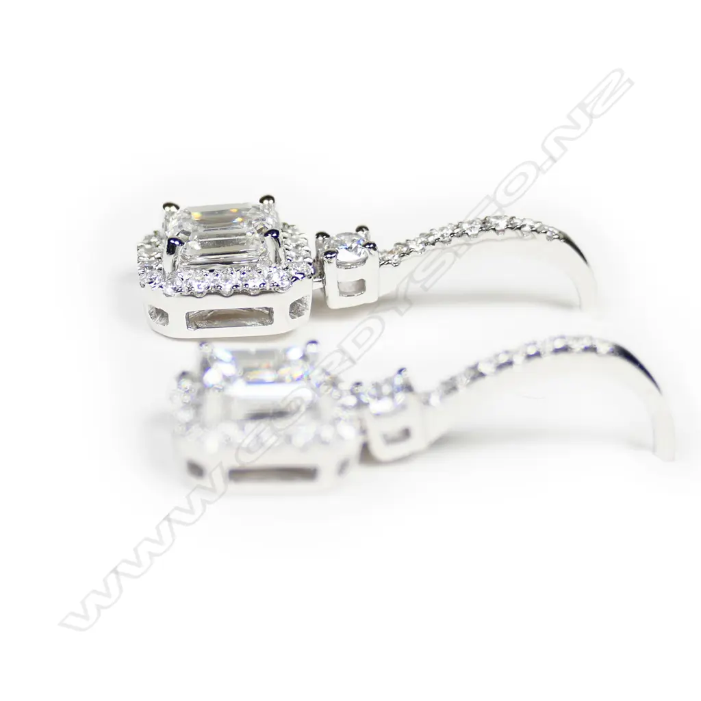 A pair of 18ct white gold and diamond earrings, Image 1++