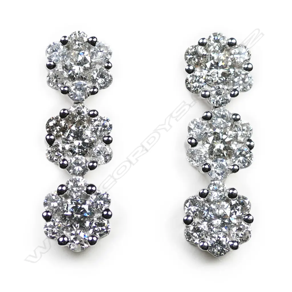 A pair of 18ct white gold and diamond earrings, Image 1++
