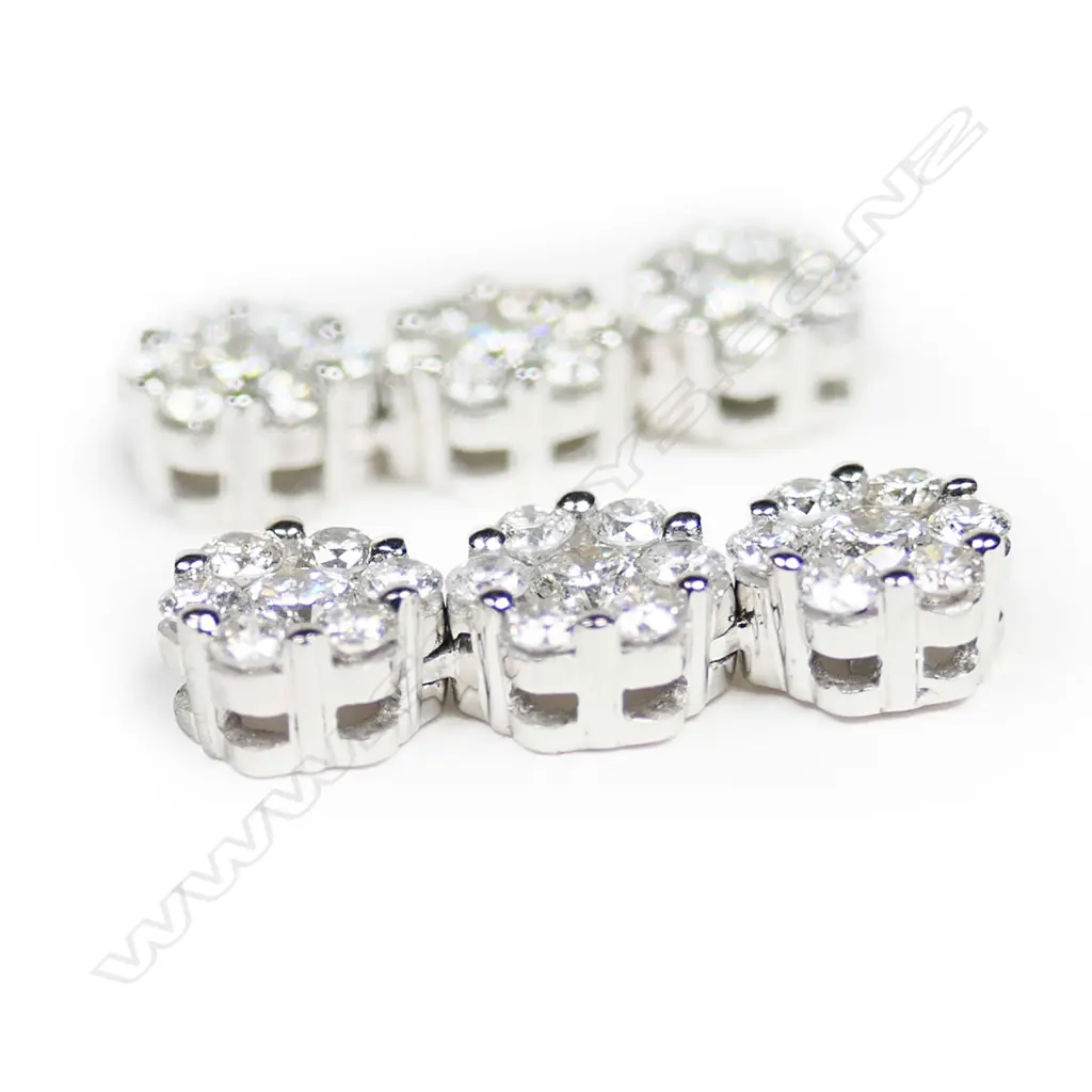 A pair of 18ct white gold and diamond earrings, Image 1++