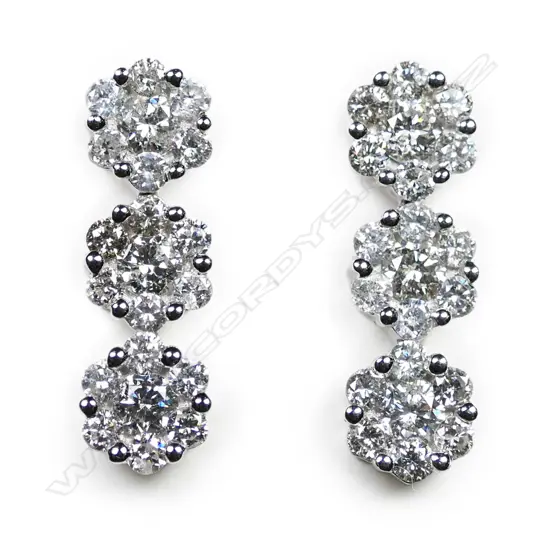 A pair of 18ct white gold and diamond earrings,