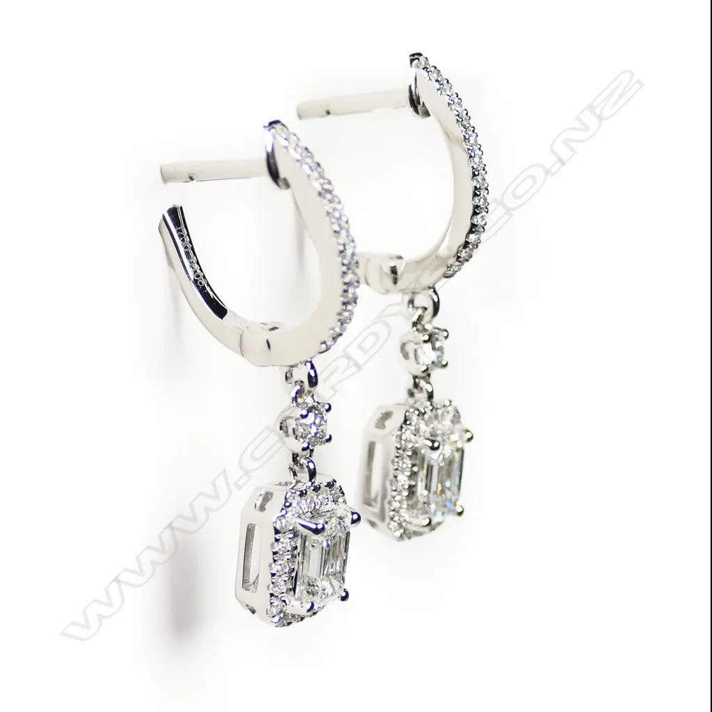 A pair of 18ct white gold and diamond earrings, Image 1++