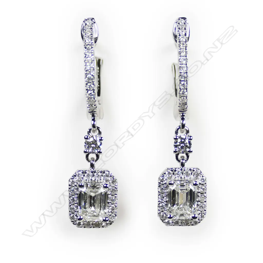 A pair of 18ct white gold and diamond earrings, Image 1++