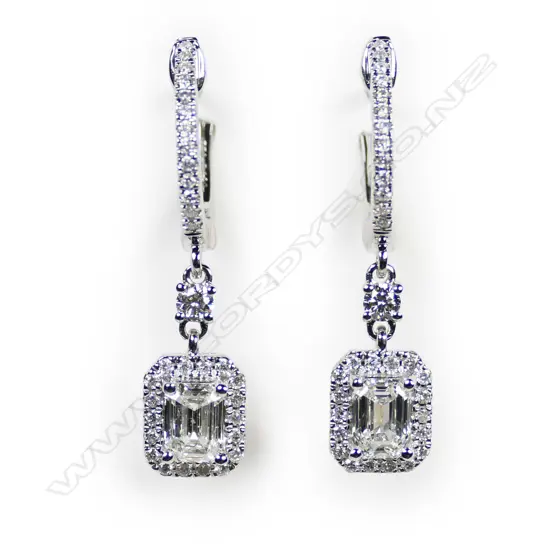 A pair of 18ct white gold and diamond earrings,