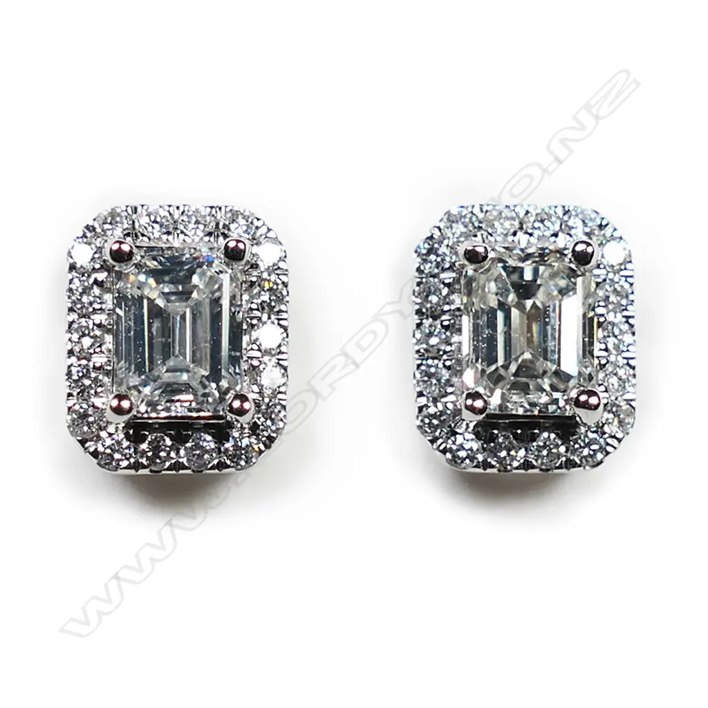 A pair of 18ct white gold and diamond earrings, Image 1++
